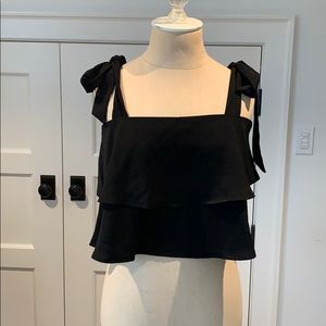 By the way. Black ruffle top